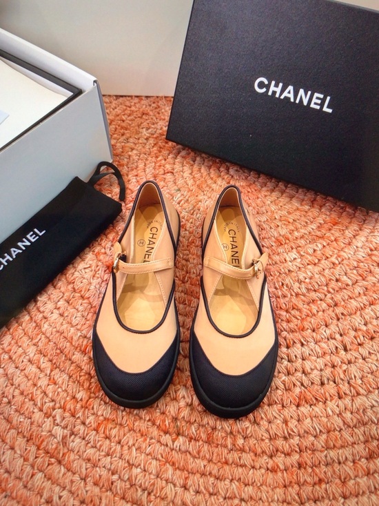 CHANEL Shoes - CHANEL Beige and Black Mary Jane Flats with Gold Buckle